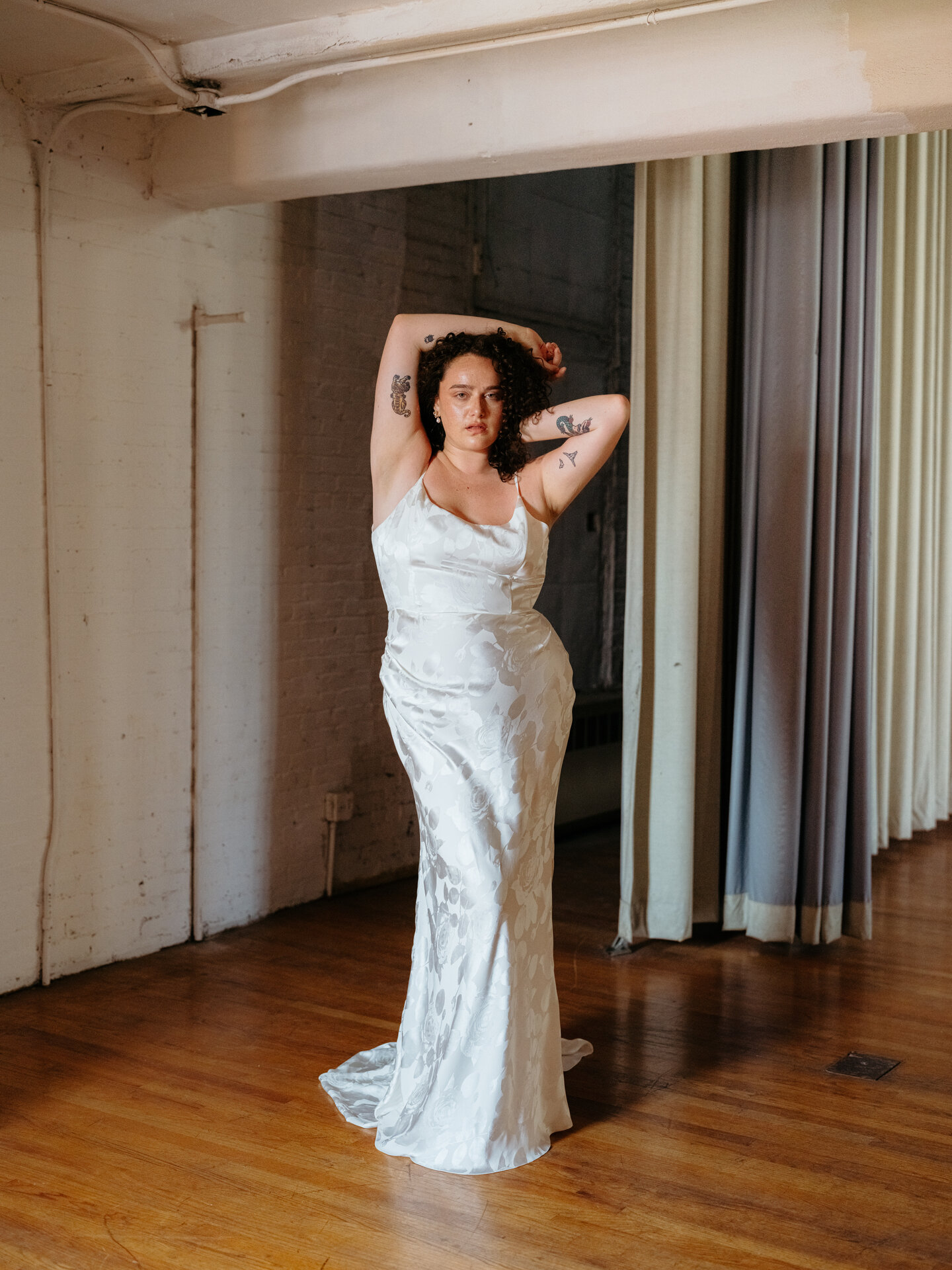 A model wearing a Loulette wedding dress.
