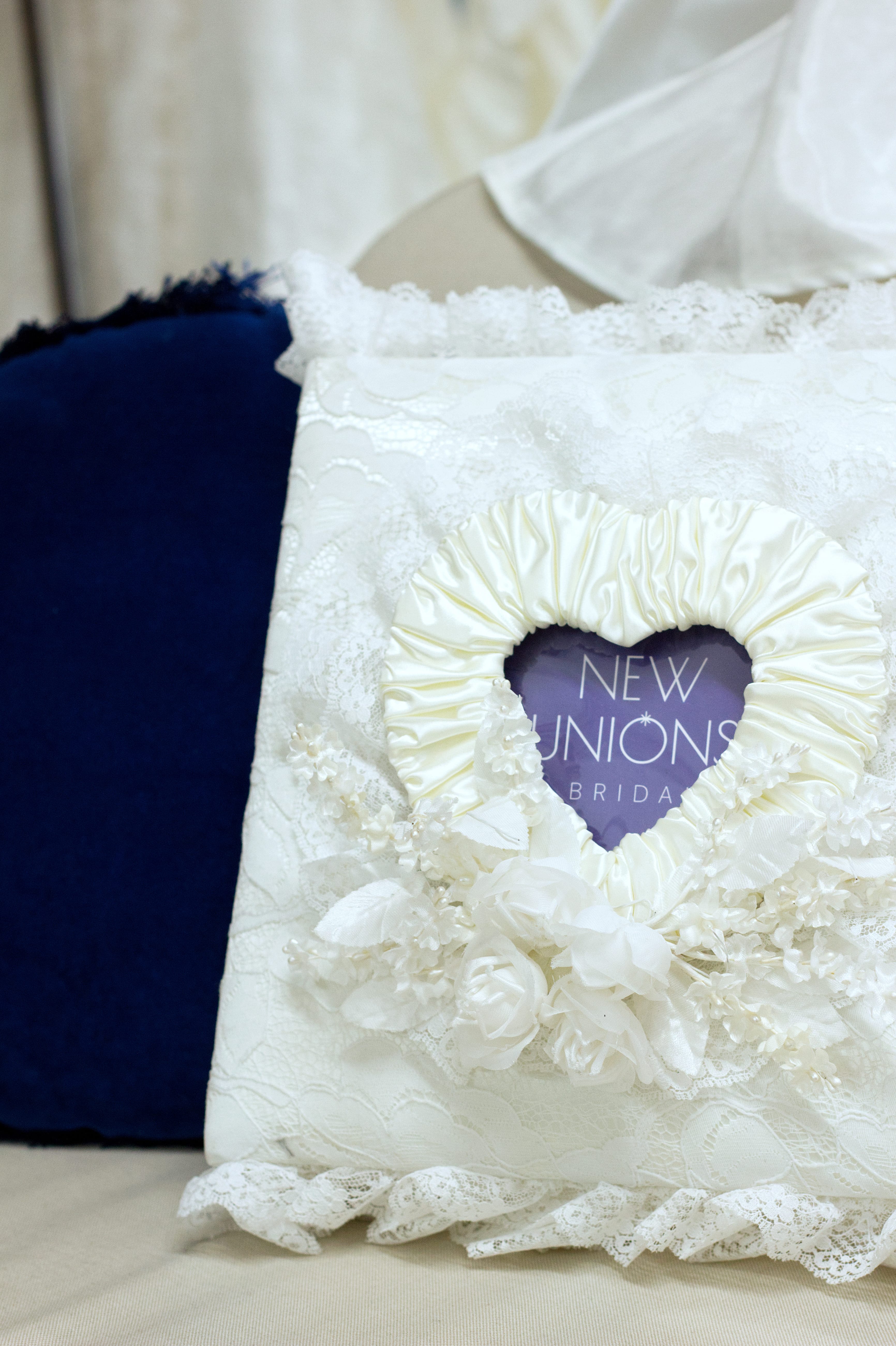 The Book of Nearlyweds, a photo book filled with polaroids of our customers rocking the wedding outfit they picked.